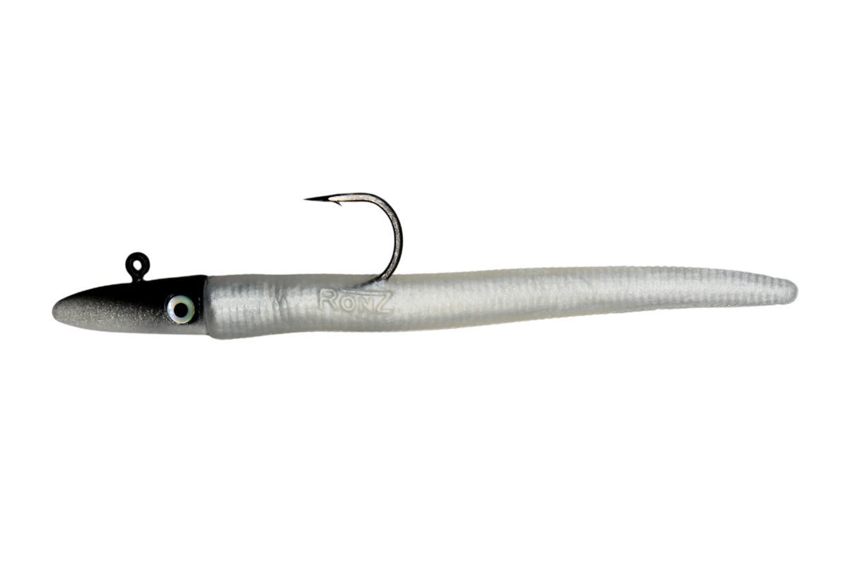 A soft plastic fishing lure shaped like a small eel or worm, with a black head, white eye, and a single metal hook attached at the front, shown on a plain white background.
